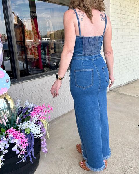 A washed denim midi dress